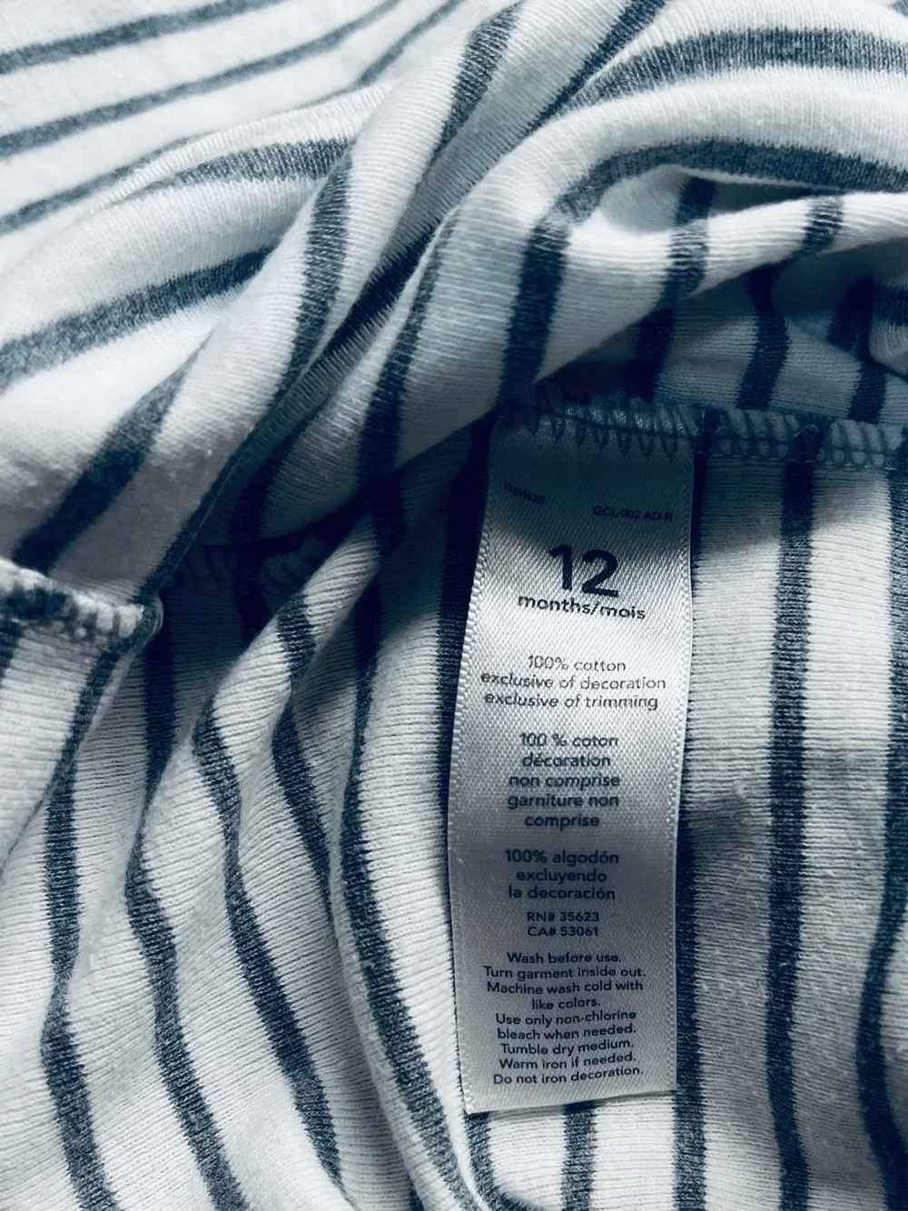Carter’s cotton stripped onesie set 